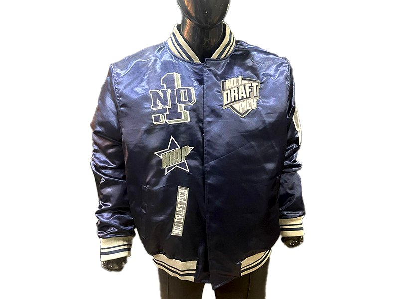 Navy-blue satin jacket with varsity-inspired Yankee detailing, snap-button front, and ribbed trim for a clean, sporty streetwear look